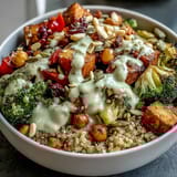 Stuffed with quinoa, chickpeas, roasted vegetables, and fresh greens, this vibrant Meal Prep Week-Long Power Bowl is ready for the week.